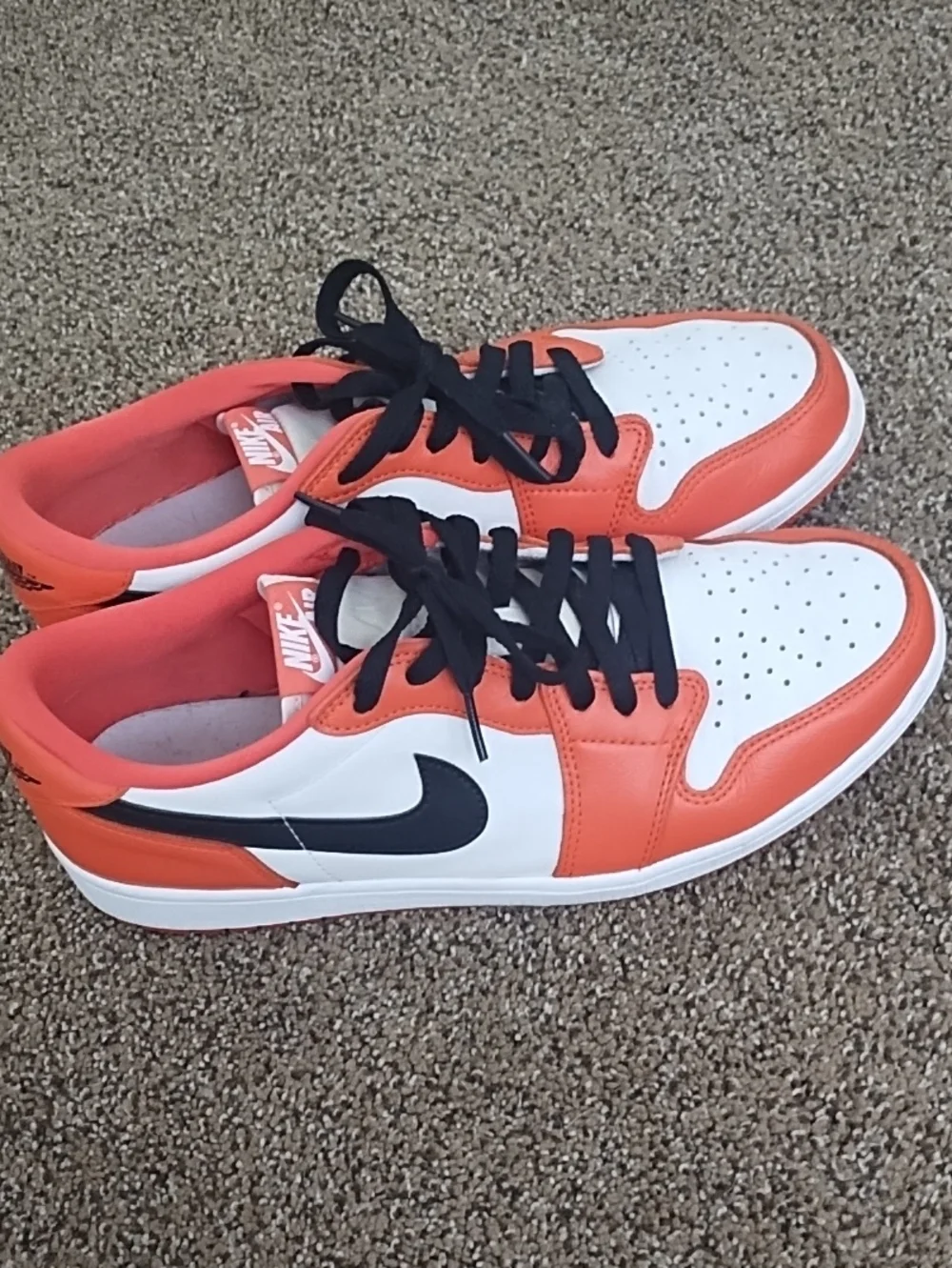 Nike Air Jordans Low Top Sneakers in White, Orange and Black